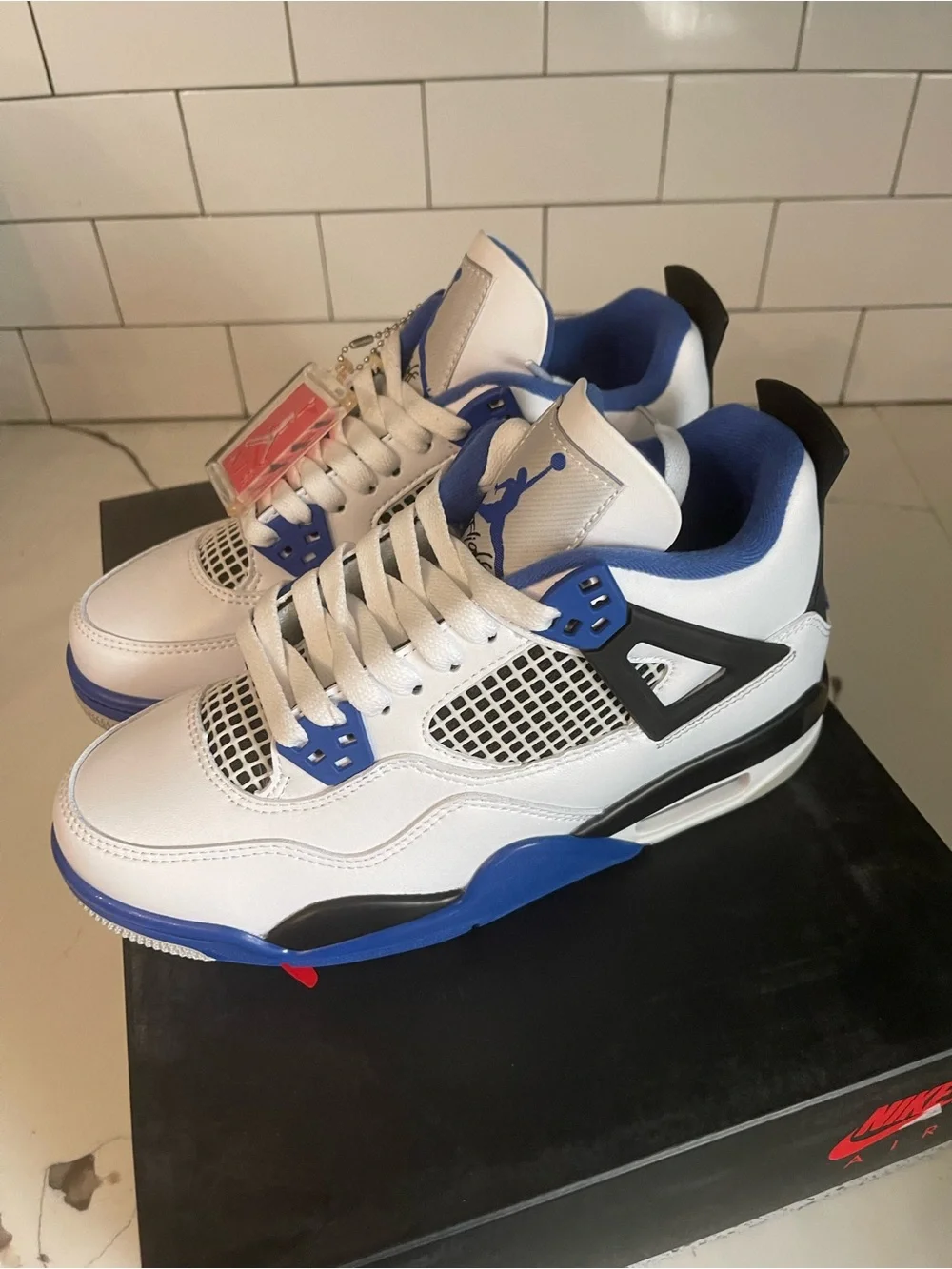 Men’s Retro 4 Motorsports Size 5.5.
